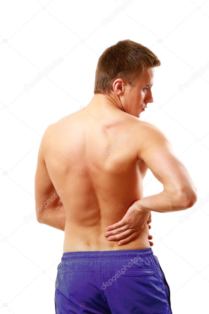 Young man having pain in his back