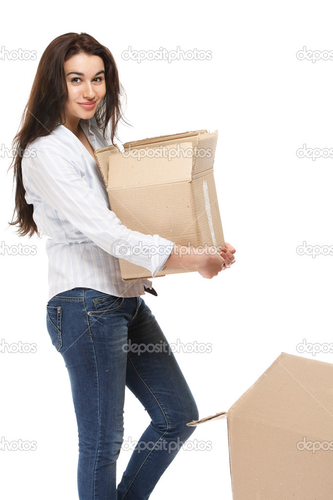 Young woman carrying a box