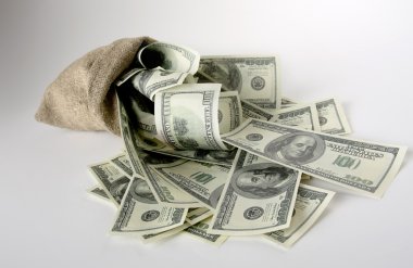 Sack with one hundred dollar bills clipart