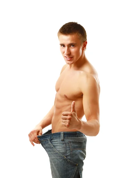 Man showing how much weight he lost — Stock Photo, Image