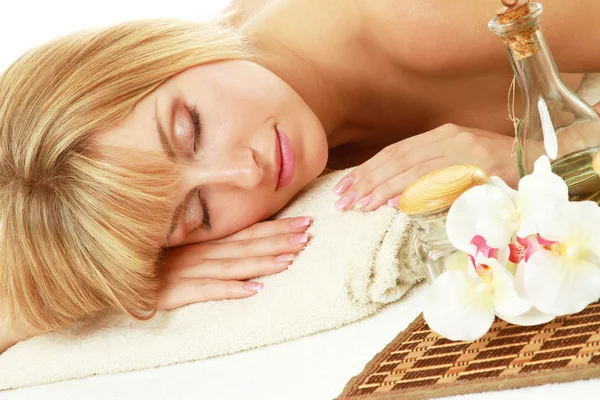 Young blonde woman at spa procedure — Stock Photo, Image
