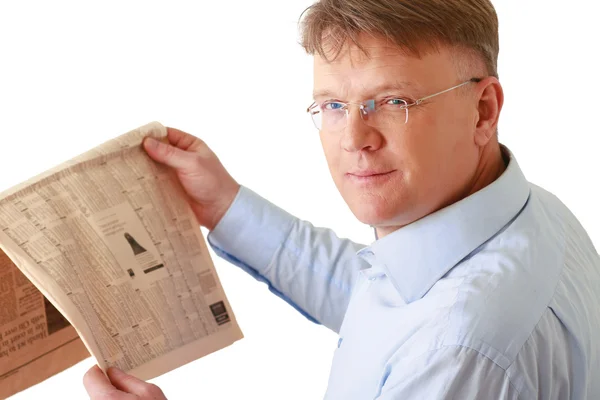 Businessman reading a newspaper — Stock Photo, Image