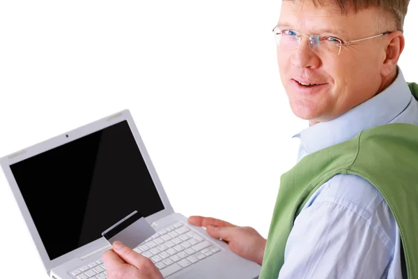 Man with laptop and card — Stock Photo, Image