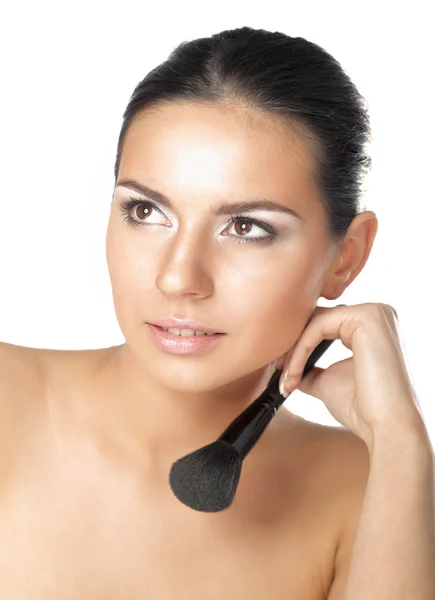 Young adult woman applying blusher — Stock Photo, Image