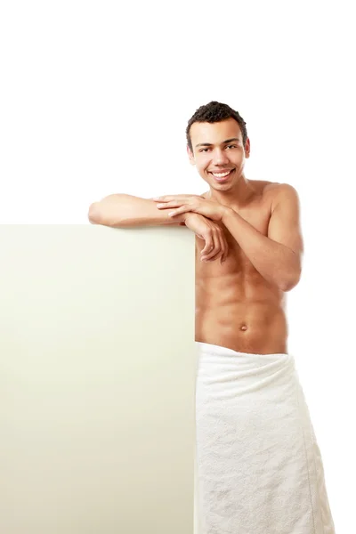 Man covering himself with a towel — Stock Photo, Image