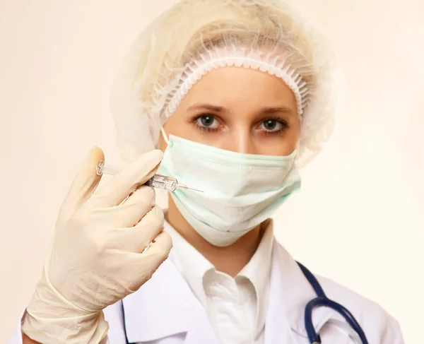 Medical doctor with syringe — Stock Photo, Image