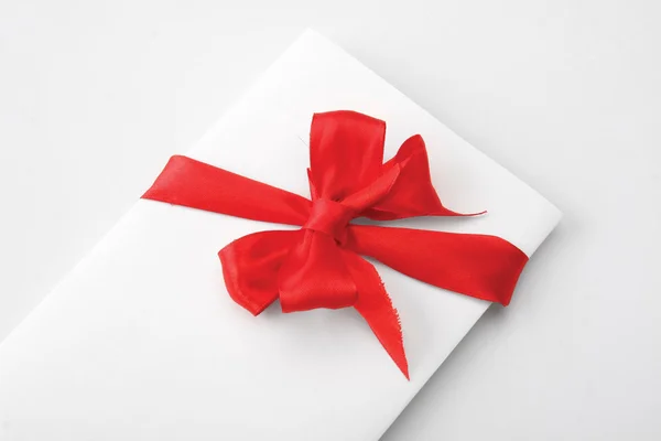 Christmas card with red bow — Stock Photo, Image