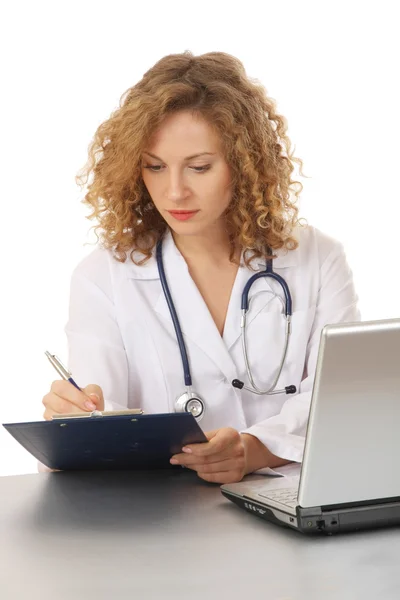 Female doctor at her workplace — Stock Photo, Image