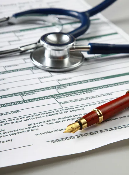 Stethoscope on medical billing statement — Stock Photo, Image