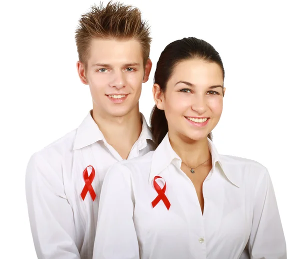 Couple using red for AIDS, — Stock Photo, Image