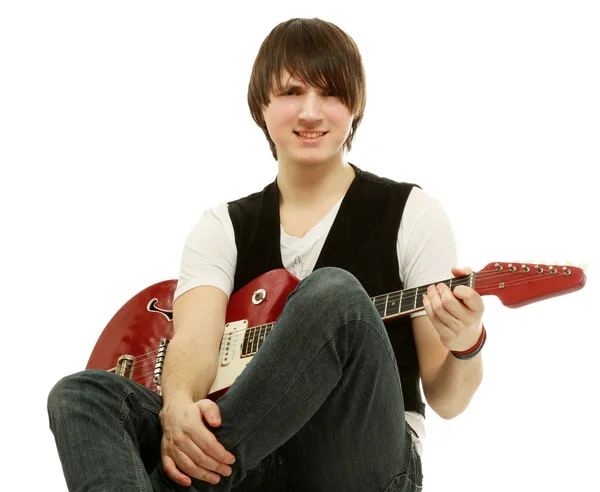 Rocker with his red electric guitar — Stock Photo, Image