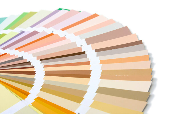 Paintbrush and colorful paints