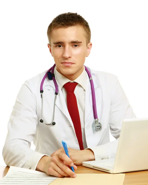 The doctor writing on the desk — Stock Photo, Image