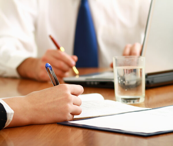 Colleagues working together in office