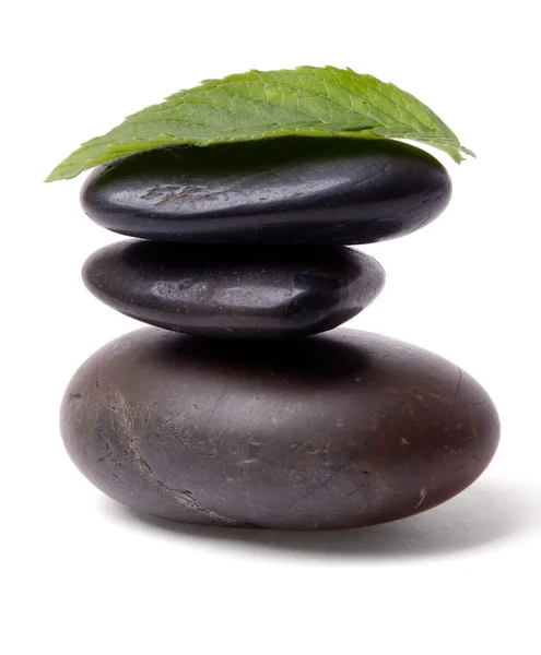 Mint leaf and Stack of stones — Stock Photo, Image