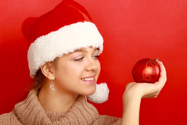 Mooie vrouw bedrijf ballen — Stockfoto