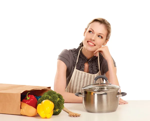 Portrait of a woman cooking in her kitchen — Stock Photo, Image