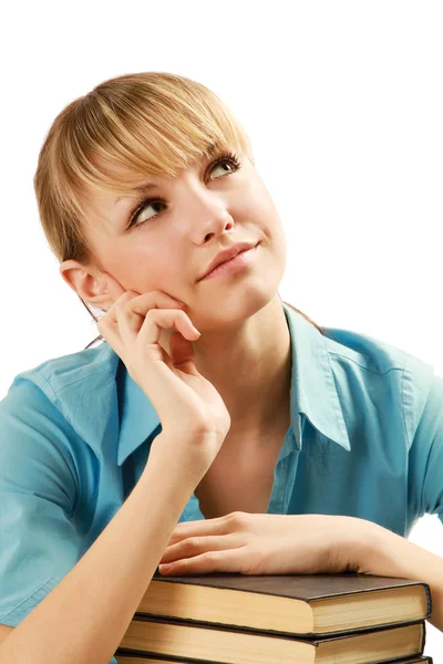 Woman with books on a desk — Stock Photo, Image