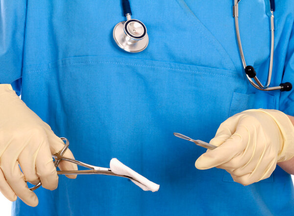 Below view of surgeons holding medical instruments