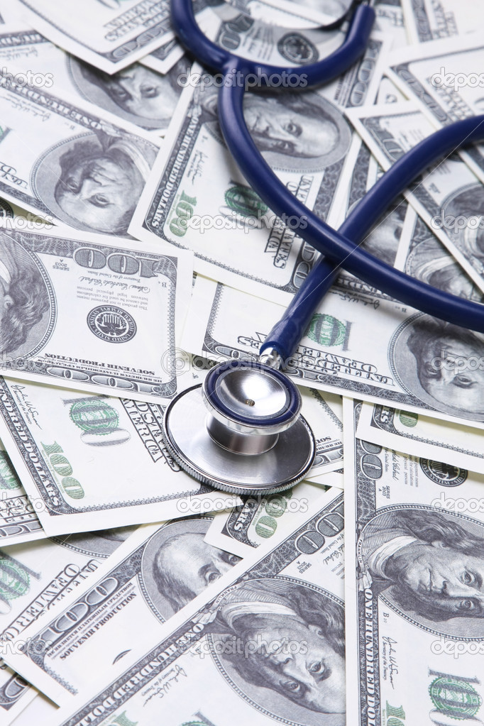 Heap of dollars with stethoscope