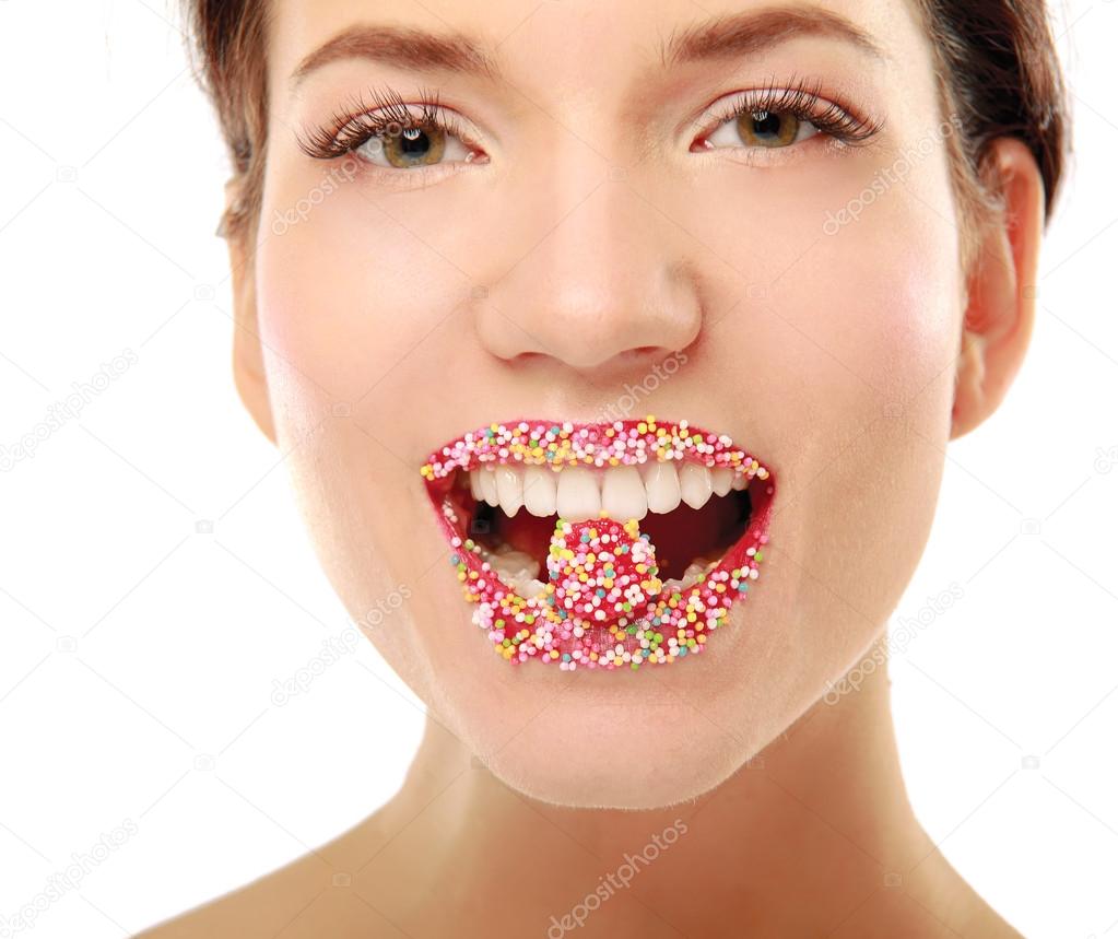 Woman lips with multicolored pearls
