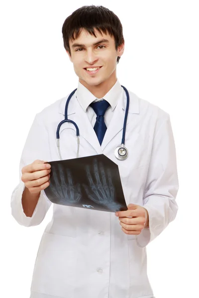 Young male doctor with an X-ray picture — Stock Photo, Image