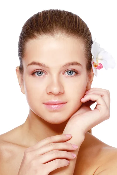 Young woman touching her face — Stock Photo, Image