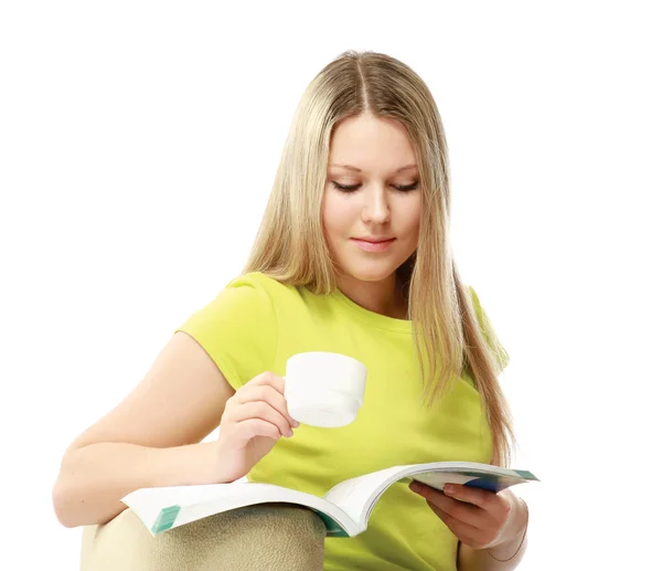 Menina da faculdade com um livro e xícara de café — Fotografia de Stock