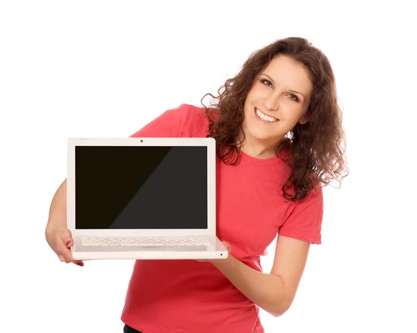 Mooie vrouw toont een laptop — Stockfoto