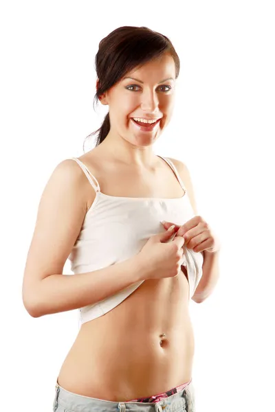 Žena ukazující její břicho — Stock fotografie