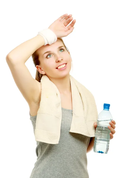 Mujer deportiva con toalla y botella de agua —  Fotos de Stock