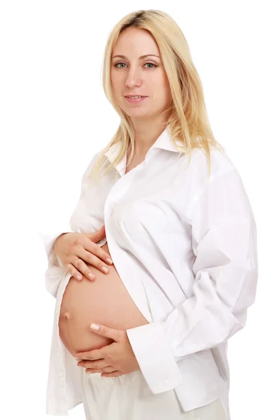 Gravid kvinna som rör sin mage — Stockfoto