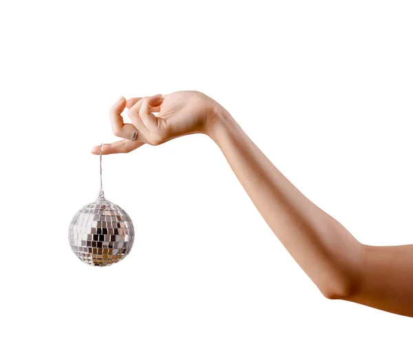 Female hand holding a ball — Stock Photo, Image