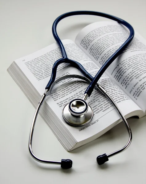 Stethoscope on a book — Stock Photo, Image