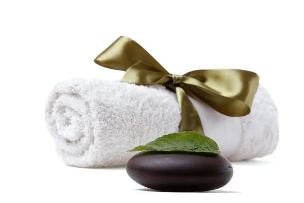Stone, towel and leaf of mint — Stock Photo, Image
