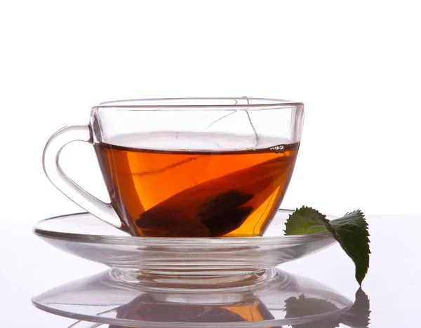 Xícara de chá com um saco de chá — Fotografia de Stock