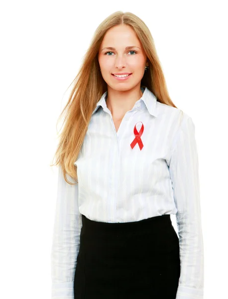 Vrouw met een lint aids gespeld aan haar shirt — Stockfoto