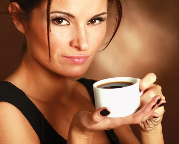 Woman with  coffee in hands — Stock Photo, Image