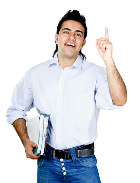 Hombre con libros apuntando hacia arriba — Foto de Stock