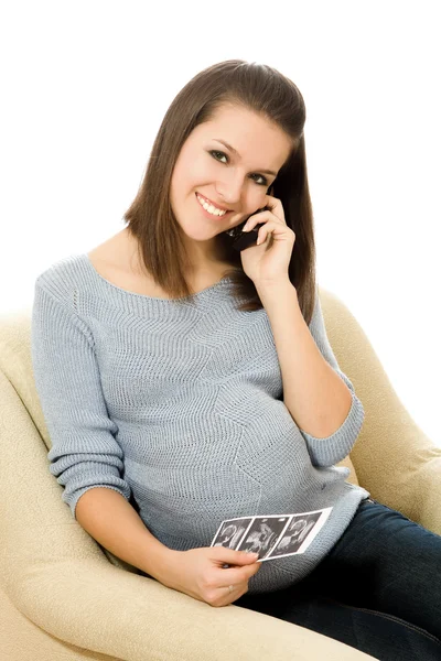 Gravid kvinna med telefonen. — Stockfoto