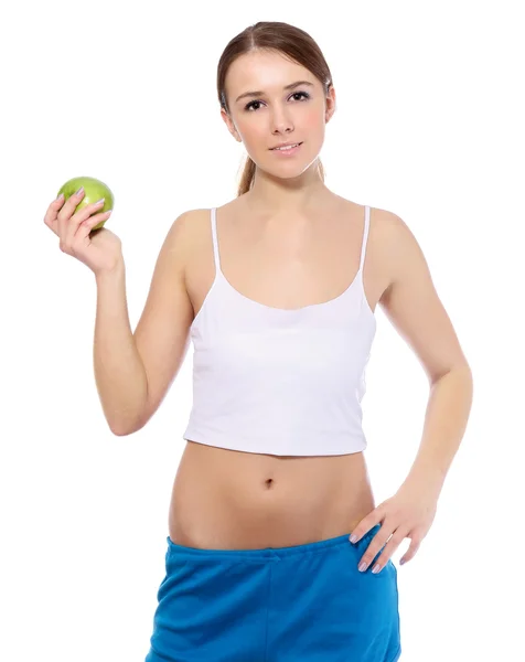 A smiling girl with green apple — Stock Photo, Image