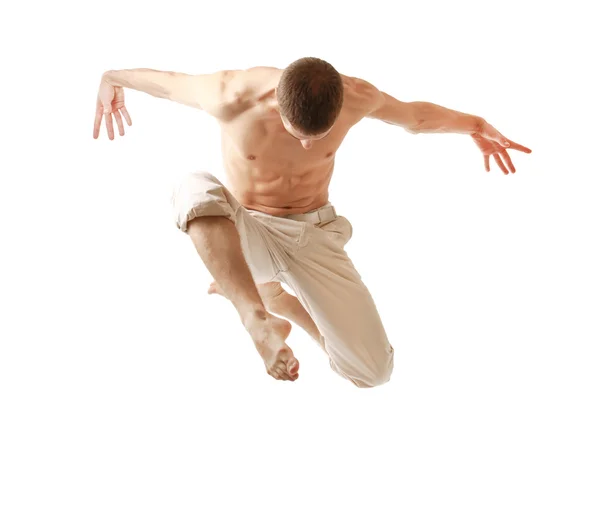 Young man jumping high — Stock Photo, Image