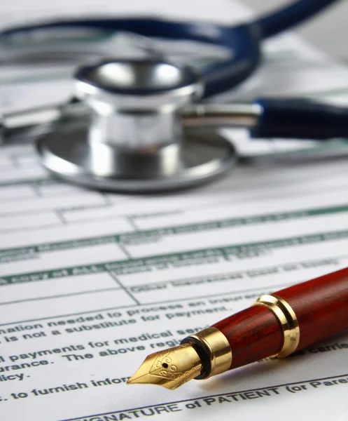 Stethoscope on medical billing statement — Stock Photo, Image