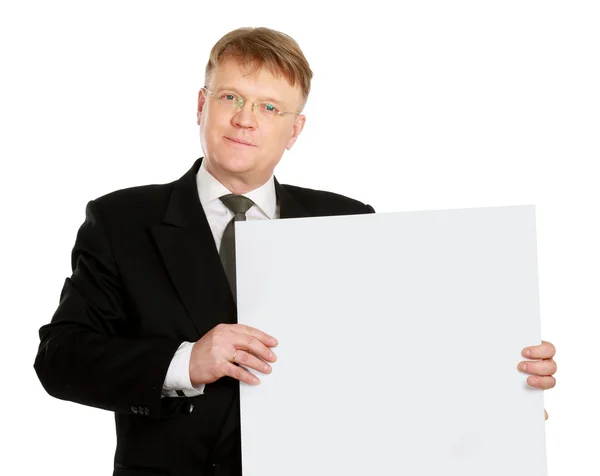 Businessman holding a banner — Stock Photo, Image