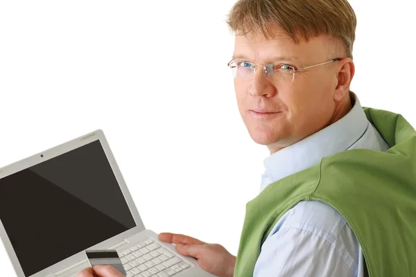 Man  laptop, holding a credit card. — Stock Photo, Image