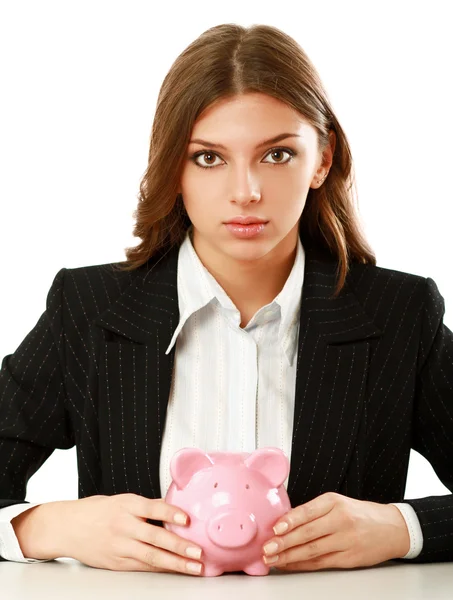 Jovem mulher sentado com porquinho banco — Fotografia de Stock