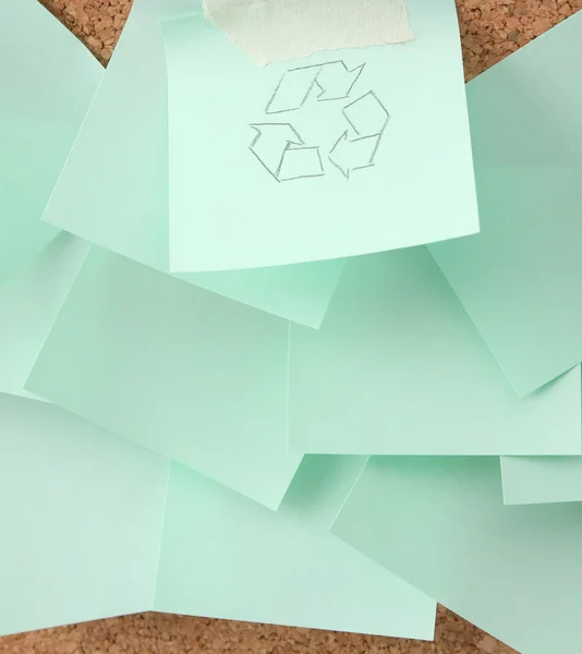 Recycle sign on green sheet of paper. — Stock Photo, Image