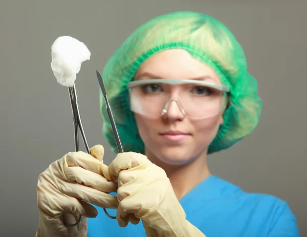 Portrait of young woman doctor surgeon — Stock Photo, Image