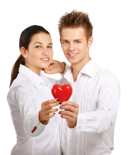 Couple holding a red heart — Stock Photo, Image