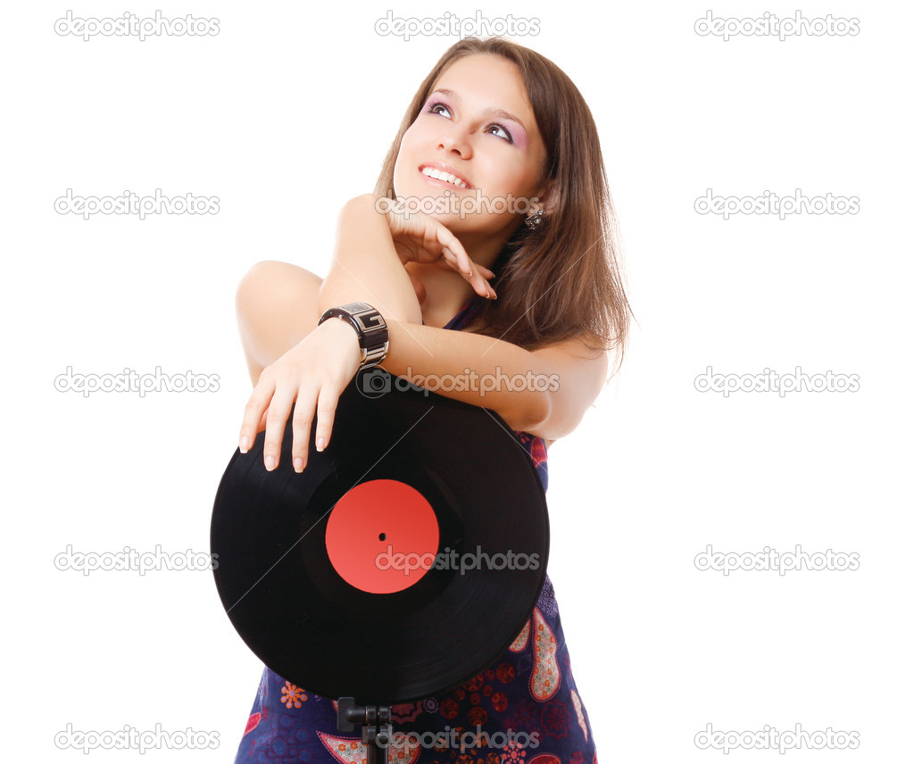 Party woman with vinyl disc as a microphone